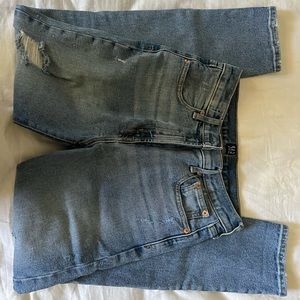 Gap medium-wash, high waisted skinny jeans, size 27r, small rips (in design)